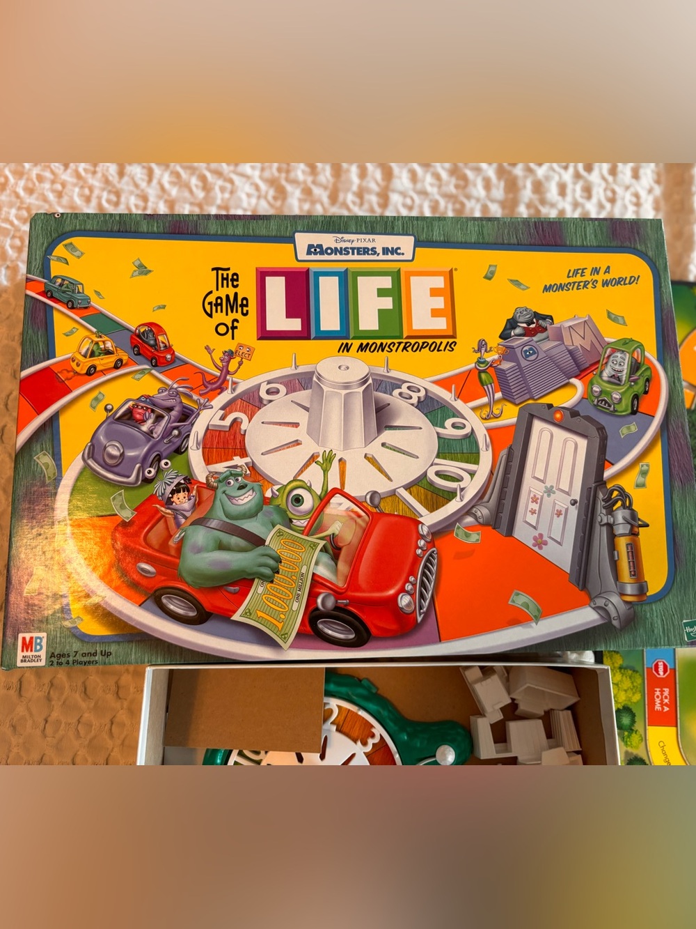 The Game of Life in Monstropolis Board Game - Yellow/Red